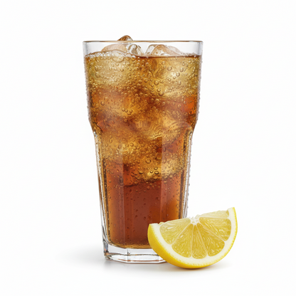 Bicchiere di Coca-Cola Lemon con bollicine visibili e fetta di limone fresca accanto, enfatizza gusto fruttato e naturale