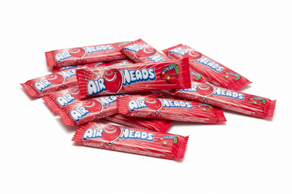  Diverse confezioni di Airheads red cherry in primo piano, ideale per collezionare, condividere o creare mini pack per contenuti social.
